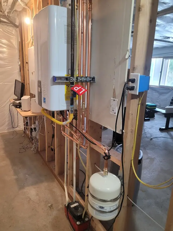 Licensed plumber repairing a kitchen sink in Crowley
